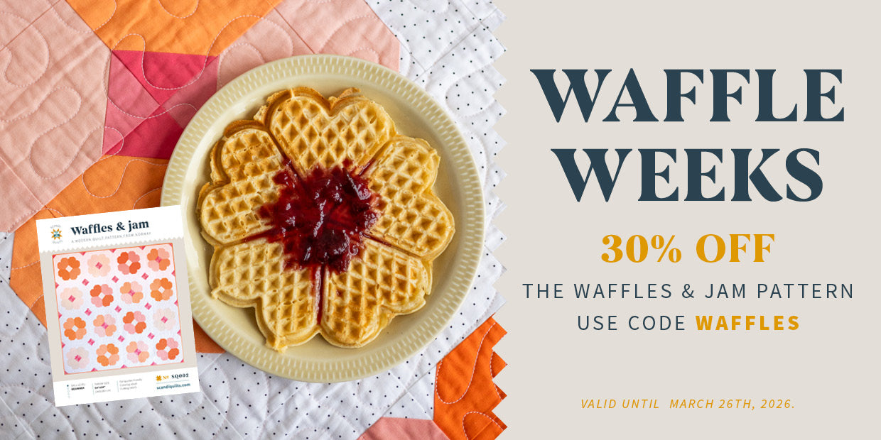 Waffle with jam on a plate, surrounded by colorful quilt blocks, with a promotional banner for 'Waffle Weeks' sale.